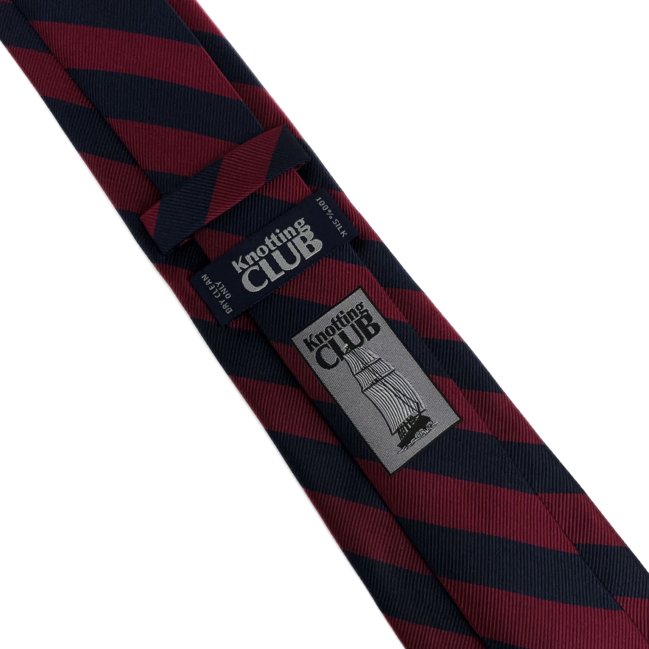Red and Navy Blue Striped Silk Regimental tie's logo and tag on the back side of the tie
