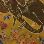 close up of a Mustard pashmina-cashmere scarf with multicolored safari animal print