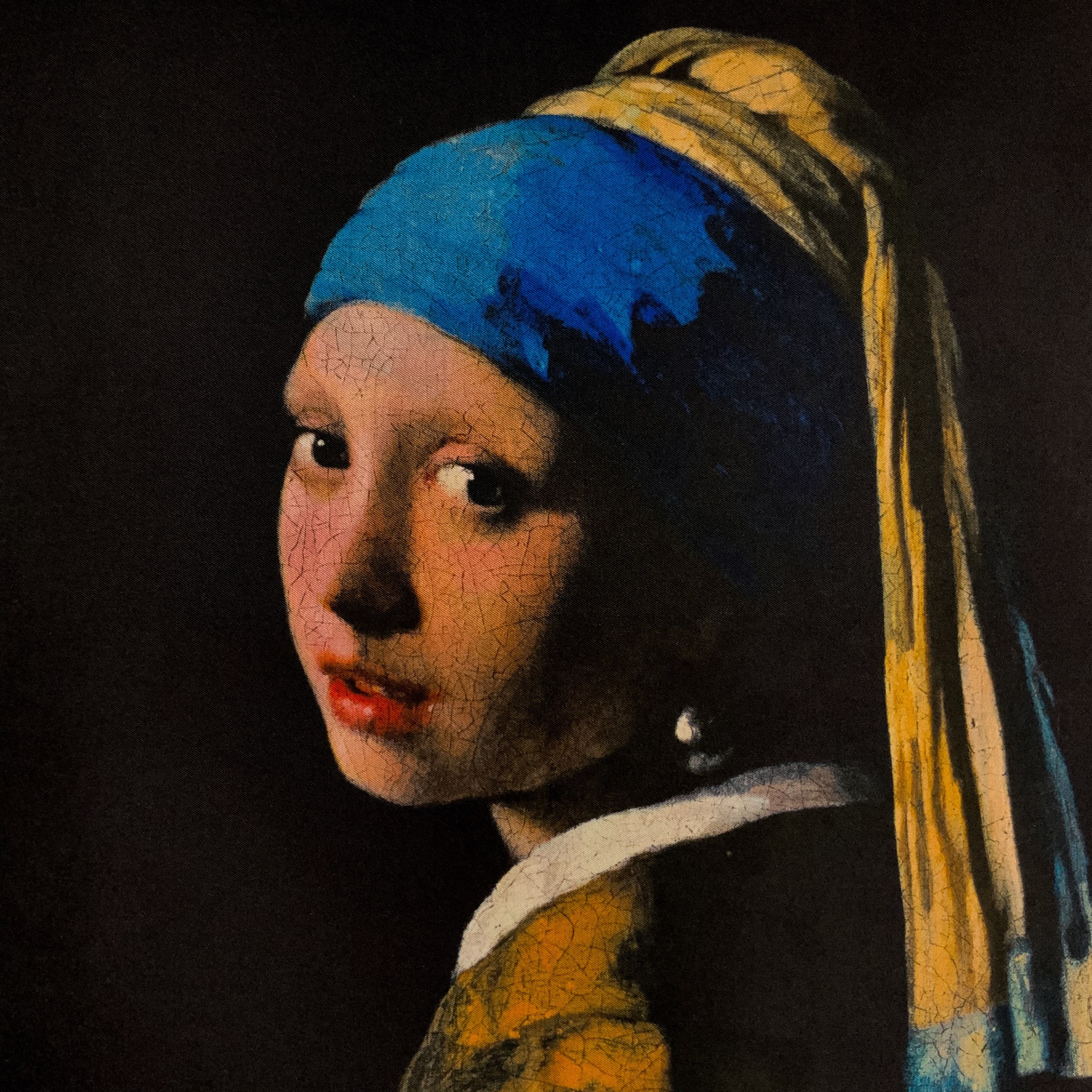 Girl with a pearl earring historical fine art silk pocket square printed on 16mm mulberry silk twill and with hand rolled edges.